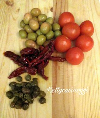 Orata alla mediterranea con pomodorini e olive